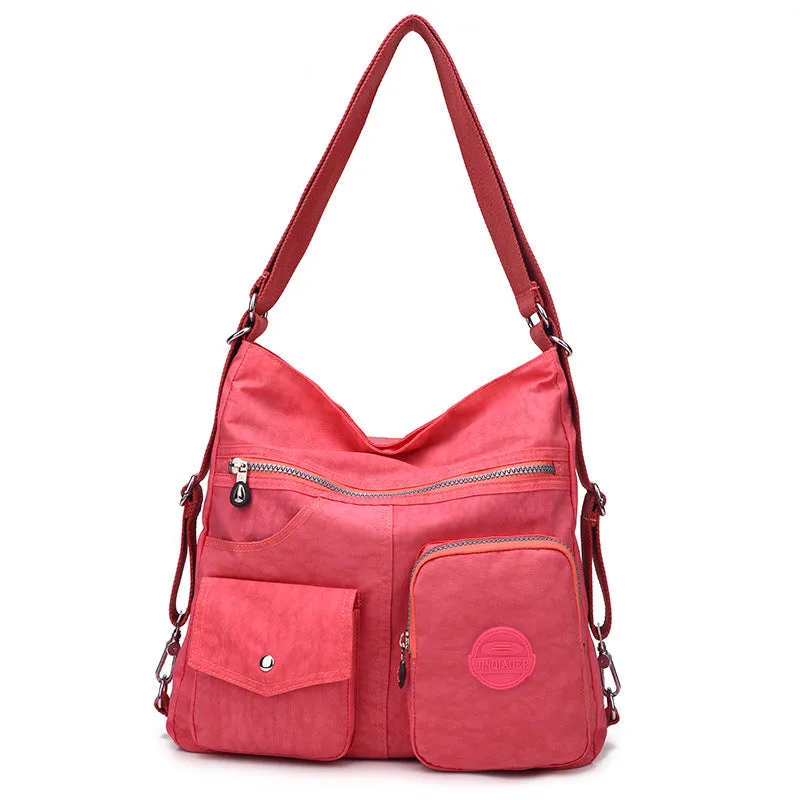 Carly – Crimson Multi-Pocket Crossbody Bag with Adjustable Strap