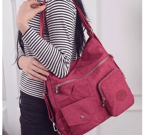 Carly – Crimson Multi-Pocket Crossbody Bag with Adjustable Strap